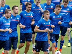 Players attend a training session of Iceland's national soccer team at their base camp in Annecy, France, on June 30, 2016