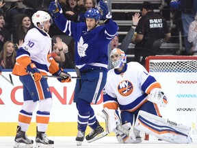 Toronto Maple Leafs left winger Matt Martin celebrates a Josh Leivo goal against the New York Islanders on Feb. 14, 2017