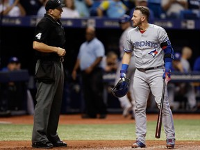 Toronto Blue Jays' Josh Donaldson questions home plate umpire Chad Fairchild after being called out on strikes on Aug. 22, 2017