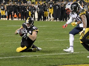 Pittsburgh Steelers tight end Jesse James has a knee down before crossing the goal line with a pass from quarterback Ben Roethlisberger on Dec. 17, 2017