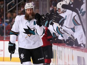 Joe Thornton of the San Jose Sharks celebrates with teammates on the bench after scoring a goal against the Arizona Coyotes during the first period of the NHL game at Gila River Arena on November 22, 2017 in Glendale, Arizona.  (Photo by Christian Petersen/Getty Images)