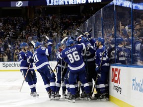 The Tampa Bay Lightning celebrate an overtime win on Dec. 9, 2017