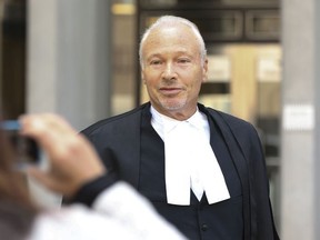 Lawyer Randall Barrs emerges from the 361 University courthouse. Barrs was attacked and shot multiple times by a gunman outside his Yorkville area office on Tuesday September 20 by Grayson Delong, 51, who is now facing 15 charges including attempted murder on Thursday October 13, 2016. Jack Boland/Toronto Sun/Postmedia Network