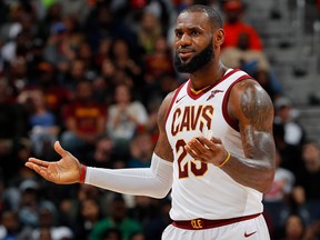 LeBron James of the Cleveland Cavaliers reacts during the game against the Atlanta Hawks at Philips Arena on Nov. 30, 2017