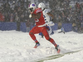Bills running back LeSean McCoy scores a touchdown against the Colts during overtime action in Orchard Park, N.Y., Sunday, Dec. 10, 2017.