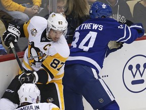 Pittsburgh Penguins' Sidney Crosby (87) checks Toronto Maple Leafs' Auston Matthews (34) off the puck in the first period of an NHL hockey game in Pittsburgh last season. (AP Photo/Gene J. Puskar)