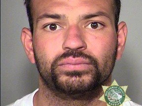 This undated file photo provided by the Multnomah County Sheriff's office shows Sergio Jose Martinez.