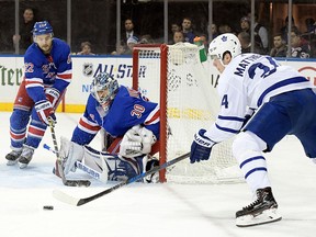 Toronto Maple Leafs centre Auston Matthews skates after the puck as New York Rangers goalie Henrik Lundqvist protects the net and Rangers defenceman Kevin Shattenkirk helps out during the first period, Saturday, Dec. 23, 2017, at Madison Square Garden in New York. (AP Photo/Bill Kostroun)