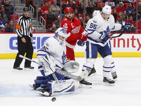 Maple Leafs goalie Curtis McElhinney makes a save against the Detroit Red Wings on Friday night. (The Associated Press)