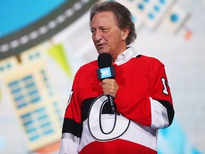 Eugene Melnyk presents at the We Day celebration at the Canadian Tire Centre on Nov. 15, 2017