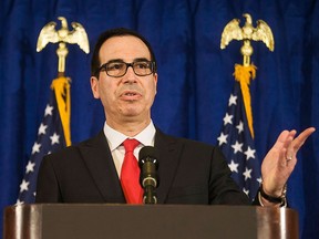 In this Sept. 21, 2017, file photo, U.S. Treasury Secretary Steve Mnuchin speaks at a news briefing at the Hilton Midtown hotel during the United Nations General Assembly, in New York. (AP Photo/Andres Kudacki, File)