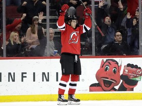 New Jersey Devils centre Nico Hischier celebrates after scoring a goal against the Detroit Red Wings on Dec. 27, 2017
