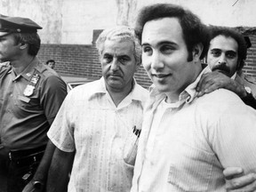 David Berkowitz is taken to a police precinct in 1977 after being arrested in connection with the "Son of Sam" murders.