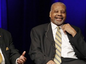 In this Sept. 27, 2016 file photo, Godfrey Dillard, left, and Perry Wallace take part in a lecture at Vanderbilt University in Nashville, Tenn. Wallace, who broke down a racial barrier by becoming the first black varsity basketball player in the Southeastern Conference, has died. He was 69. Wallace's death was announced Friday, Dec. 1, 2017, by Vanderbilt University, where Wallace became an all-SEC player and remains among the Commodores' all-time rebounding leaders. (AP Photo/Mark Humphrey, File)