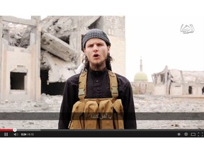 Dressed in the garb of the mujahideen, John Maguire is shown on six-minute video posted to YouTube - and later taken down - and linked on several jihadist websites. (YouTube Video Screenshot)