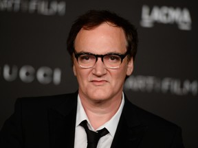 Honoree Quentin Tarantino arrives at the LACMA Art + Film Gala at LACMA on Saturday, Nov. 1, 2014, in Los Angeles. (Photo by Jordan Strauss/Invision/AP)