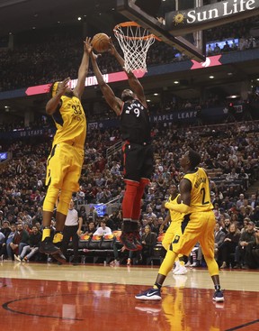 Toronto Raptors Serge Ibaka PF (9) takes the ball away from Indiana Pacers Myles Turner C (33) in the fourth quarter in Toronto, Ont. on Friday December 1, 2017. Jack Boland/Toronto Sun/Postmedia Network