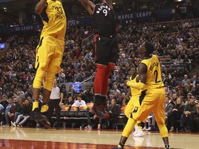 Toronto Raptors Serge Ibaka PF (9) takes the ball away from Indiana Pacers Myles Turner C (33) in the fourth quarter in Toronto, Ont. on Friday December 1, 2017. Jack Boland/Toronto Sun/Postmedia Network