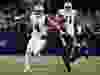 Dallas Cowboys quarterback Dak Prescott (4) runs the ball before being stopped by Washington Redskins cornerback Quinton Dunbar (47) in the first half of an NFL football game, Thursday, Nov. 30, 2017, in Arlington, Texas. (AP Photo/Ron Jenkins)