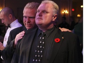 Former Toronto mayor Rob Ford (front) is pictured in November 2010 with his brother, Premier Doug Ford.