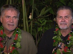 In this Dec. 23, 2017, image made from a video provided by Honolulu news station KHON, Alan Robinson and Walter Macfarlane are interviewed in Honolulu. The two Hawaii men grew up as best friends and recently learned that they're actually brothers. They revealed the surprise to family and friends over the holidays. The two, who have been friends for 60 years, were born in Hawaii 15 months apart and met in the sixth grade. (KHON via AP)