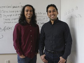 In this Wednesday, Dec. 13, 2017 photo, Yale graduate students Michael Lopez-Brau, left, and Stefan Uddenberg pose at Yale University in New Haven, Conn. (AP Photo/Pat Eaton-Robb)