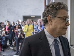 Sen. Al Franken, D-Minn., returns to his office after talking to the media on Capitol Hill in Washington, Monday, Nov. 27, 2017. (AP Photo/J. Scott Applewhite) ORG XMIT: DCSA114