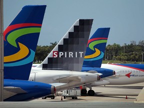 Spirit Airlines Inc. planes sit on the tarmac at the Fort Lauderdale International Airport on June 14, 2010 in Fort Lauderdale, Florida.