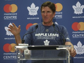 Maple Leafs head coach Mike Babcock was not impressed that the schedule-makers had his team play on back-to-back nights Thursday and Friday. (JACK BOLAND/Toronto Sun files)