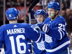 The line of Mitch Marner (left), Tyler Bozak (centre) and James van Riemsdyk received praise from coach Mike Babcock. (NATHAN DENETTE/The Canadian Press files)