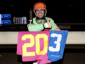 Eurico Da Silva celebrates his 203 wins during the 2017 Woodbine thoroughbred season, most among the jockeys at the Rexdale oval. He has recorded at least 200 wins three years in a row.
(WEG/MICHAEL BURNS photo)