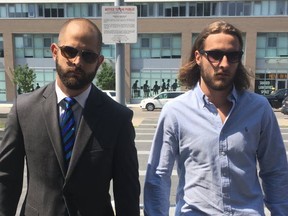 These are shots of Toronto police Const Michael Theriault (left with beard) and his brother Christian Theriault (long hair).