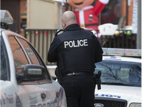 Toronto Police Services investigate at 25 Henry Place Lane in the Jarvis & Esplanade area of Toronto where a body was found early on Saturday December 16, 2017.