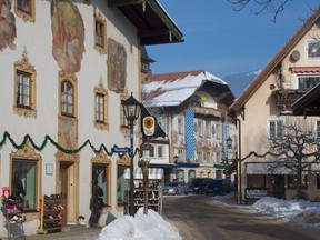 Centuries old, the solid and often fresco-covered wooden mansions in Bavaria's Oberammergau were originally financed by the global export of wood carvings.