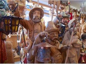 Oberammergau’s shops are crowded with wooden sculptures of secular and religious figures in all shapes and sizes, the original source of the village’s wealth. PETER NEVILLE-HADLEY/HORIZON WRITERS’ GROUP