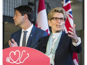 Health Minister  Eric Hoskins, Finance Minister  Charles Sousa and Premier Kathleen Wynne at Jenner Jean-Marie Community Recreation Centre for announcement Friday April 28, 2017