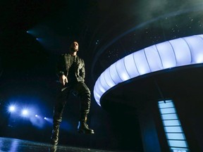 Drake floats across the stage in front of his mock CN Tower at the OVOFest held at the Budweiser stage in Toronto, Ont. on Monday August 7, 2017.