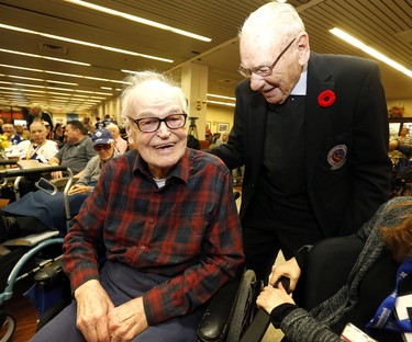 Former Hockey Night in Canada vet Murray Westgate, 99, chats with Leafs vet Johnny Bower during Leafs visit to Sunnybrook Veteran's Centre on Monday November 13, 2017.  Michael Peake/Toronto Sun
