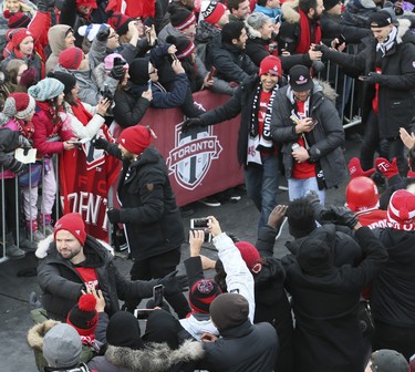 2017 MLS Championship parade on the downtown streets of Toronto. The Toronto FC team is greeted by thousands at Nathan Phillip's Square on Monday December 11, 2017. Veronica Henri/Toronto Sun/Postmedia Network