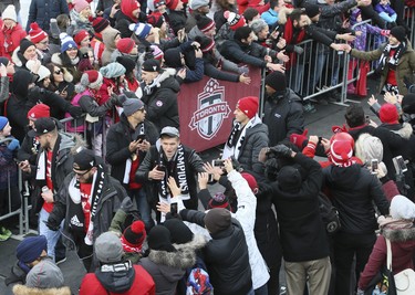 2017 MLS Championship parade on the downtown streets of Toronto. The Toronto FC team is greeted by thousands at Nathan Phillip's Square on Monday December 11, 2017. Veronica Henri/Toronto Sun/Postmedia Network