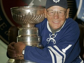Legendary Leaf goalie Johnny Bower with the Stanley Cup at the Hockey Hall of Fame in April 2006. (Toronto Sun/Craig Robertson)