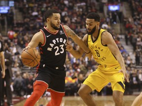 Raptors point guard Fred VanVleet (left) has stepped up in the absence of Delon Wright. (Jack Boland/Toronto Sun)