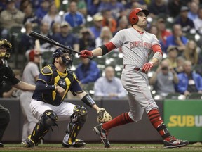 Cincinnati Reds' Joey Votto hits a home run during the first inning of a baseball game against the Milwaukee Brewers Wednesday, Sept. 27, 2017, in Milwaukee. Given Canada's love for all things hockey, Cincinnati Reds star Joey Votto was as surprised to win the Lou Marsh Trophy a second time as he was the first. (THE CANADIAN PRESS/AP, Morry Gash)