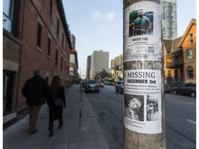 Missing persons posters for Andrew Kinsman and Drew Phelps/Drew Ballou near Church St. and Wellesley St. E in Toronto, Ont.  on Sunday December 3, 2017