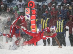 Bills QB Joe Webb dives with the ball during Sunday's game against the Colts. (GETTY IMAGES)