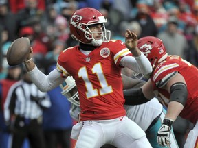 Alex Smith and the Kansas City Chiefs take on Tennessee on Saturday.
 (AP PHOTO)