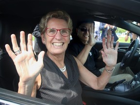 Ontario Premier Kathleen Wynne takes a ride in a Lincoln MKZ driverless car during a tour of Blackberry QNX Autonomous Vehicle Innovation Centre in Kanata on July 21, 2017.  Julie Oliver/Postmedia