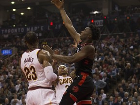 Raptors forward OG Anunoby takes an easy shot over Cavaliers star LeBron James last night.
 (STAN BEHAL/Toronto Sun)