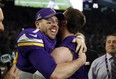 Minnesota Vikings quarterback Case Keenum (left) leads his team into Philadelphia on Sunday. (AP PHOTO)