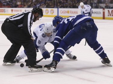 Tyler Johnson and Auston Matthews face off